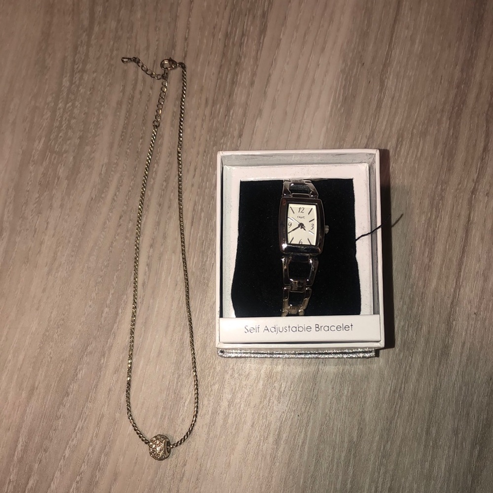 Silver necklace and watch